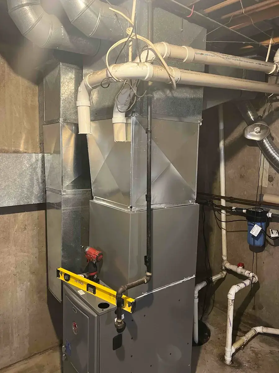 After — new furnace set, leveled and piped - Abbotsford, WI