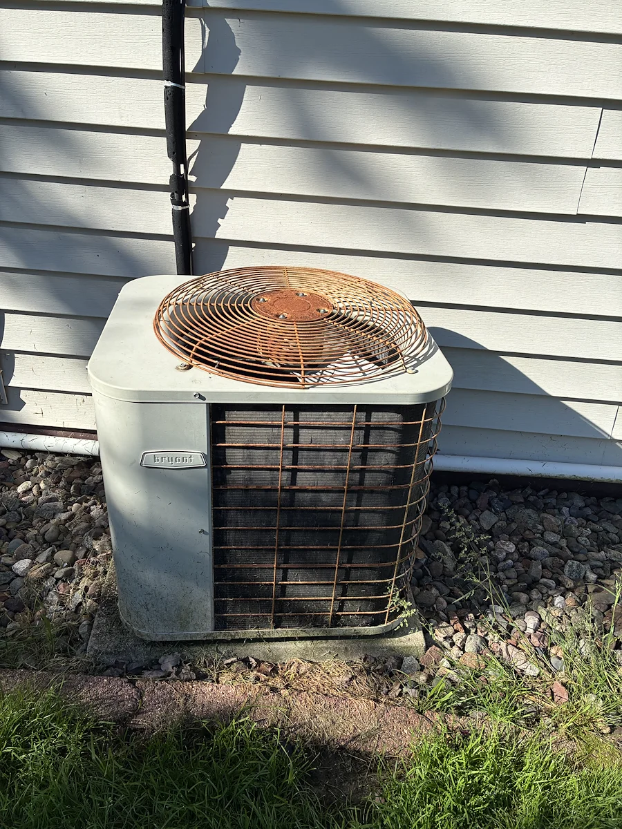 Before — the original outdoor condenser we replaced - Abbotsford, WI