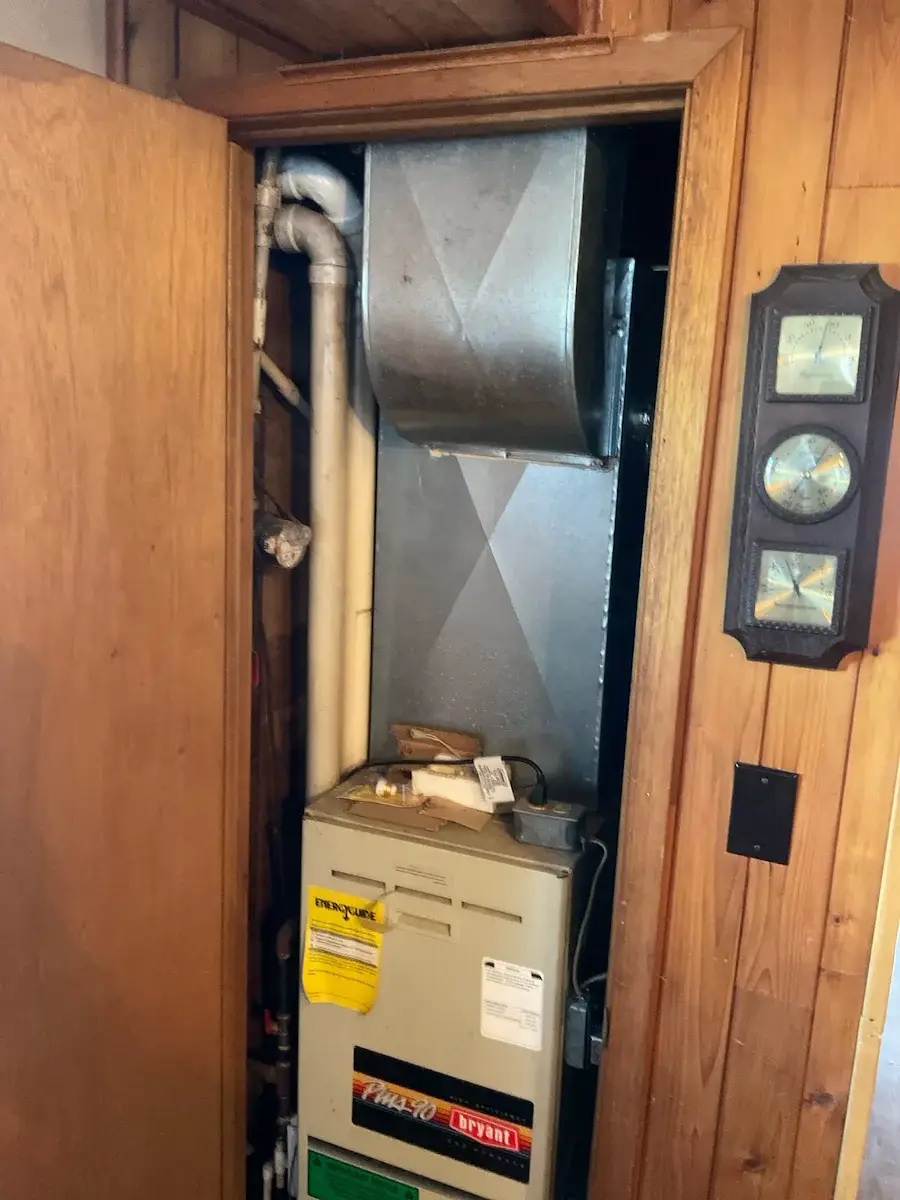Before — original closet furnace and duct transitions - Colby, WI