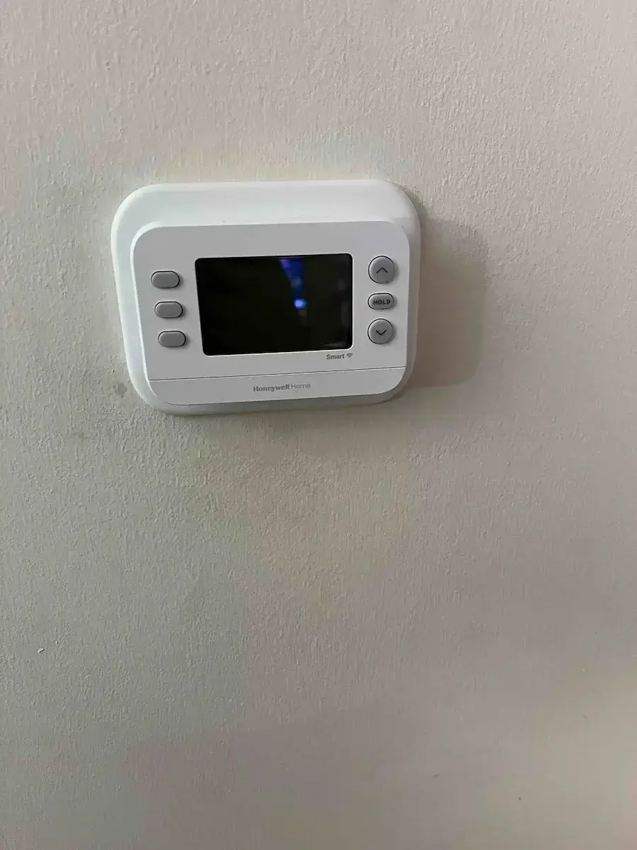 New programmable thermostat set and tested before we left
