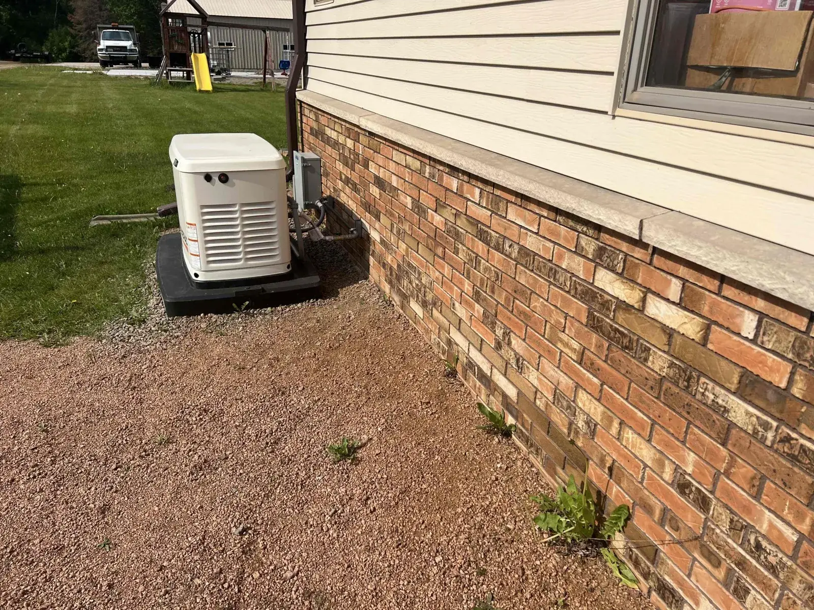 After — generator placed and backfilled, gas and power lines buried out of sight