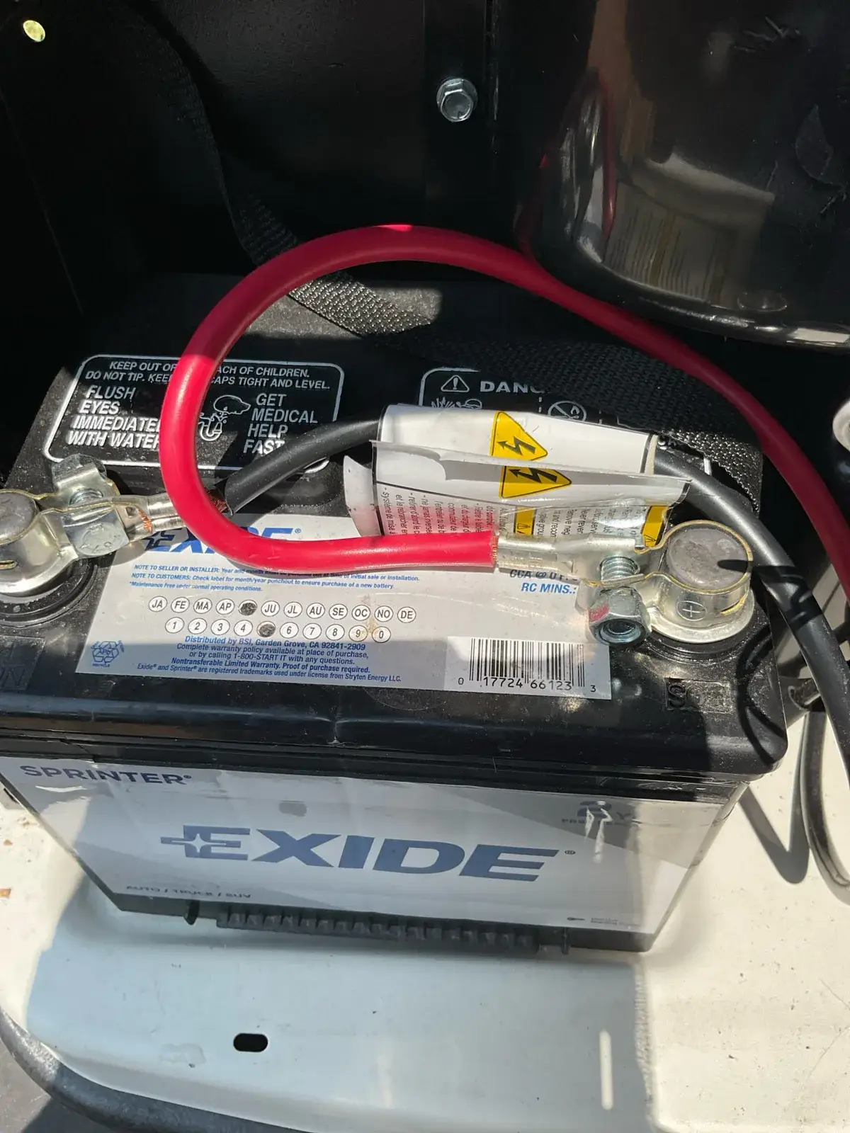 Battery installed and terminals protected during commissioning