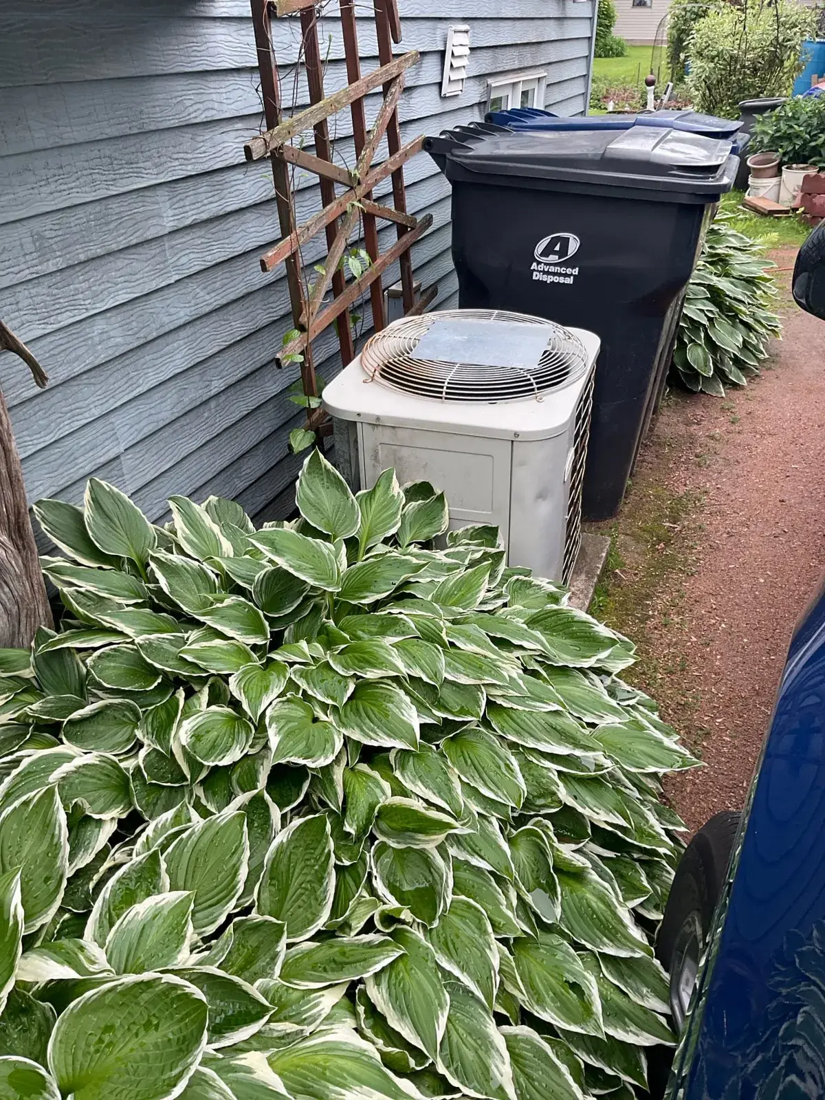 Before — the old outdoor A/C unit - Marshfield, WI