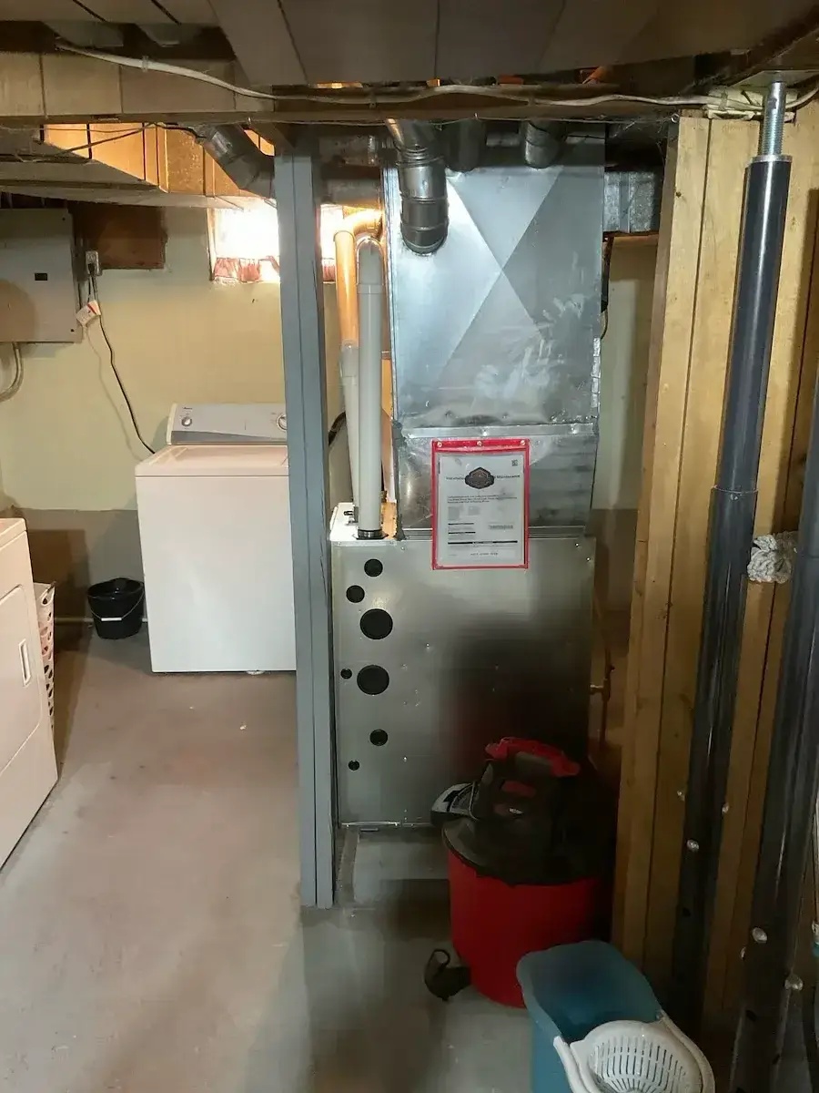 After — new furnace and sheet metal finished out beside the laundry