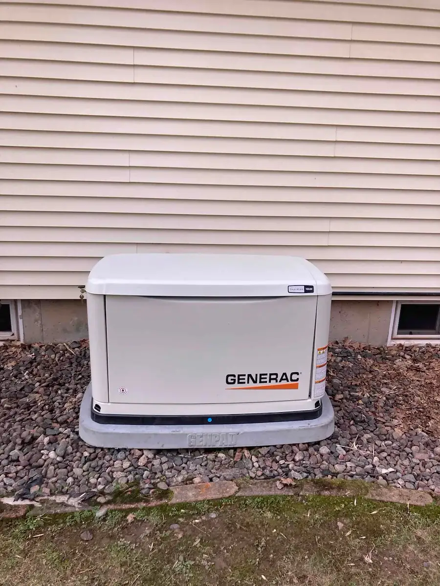 Generator install — standby generator set on its pad - Medford, WI