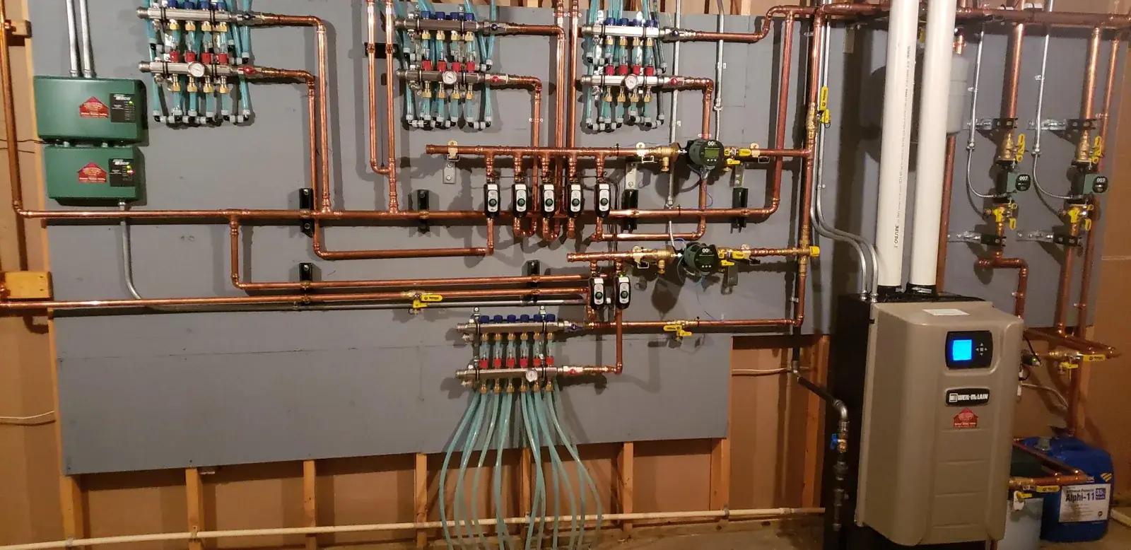Finished radiant system with the new high-efficiency condensing boiler