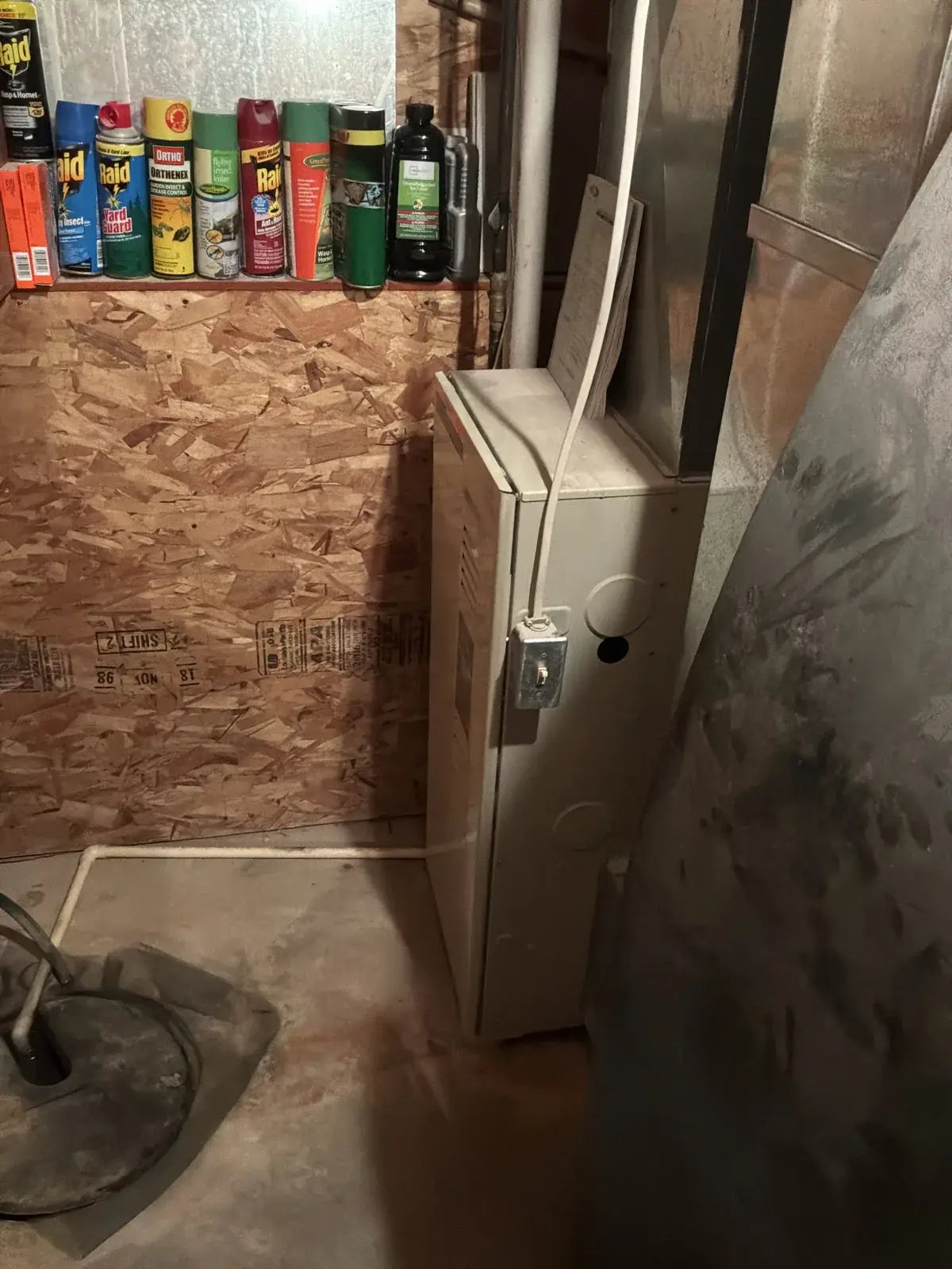 Before — the original basement furnace we replaced