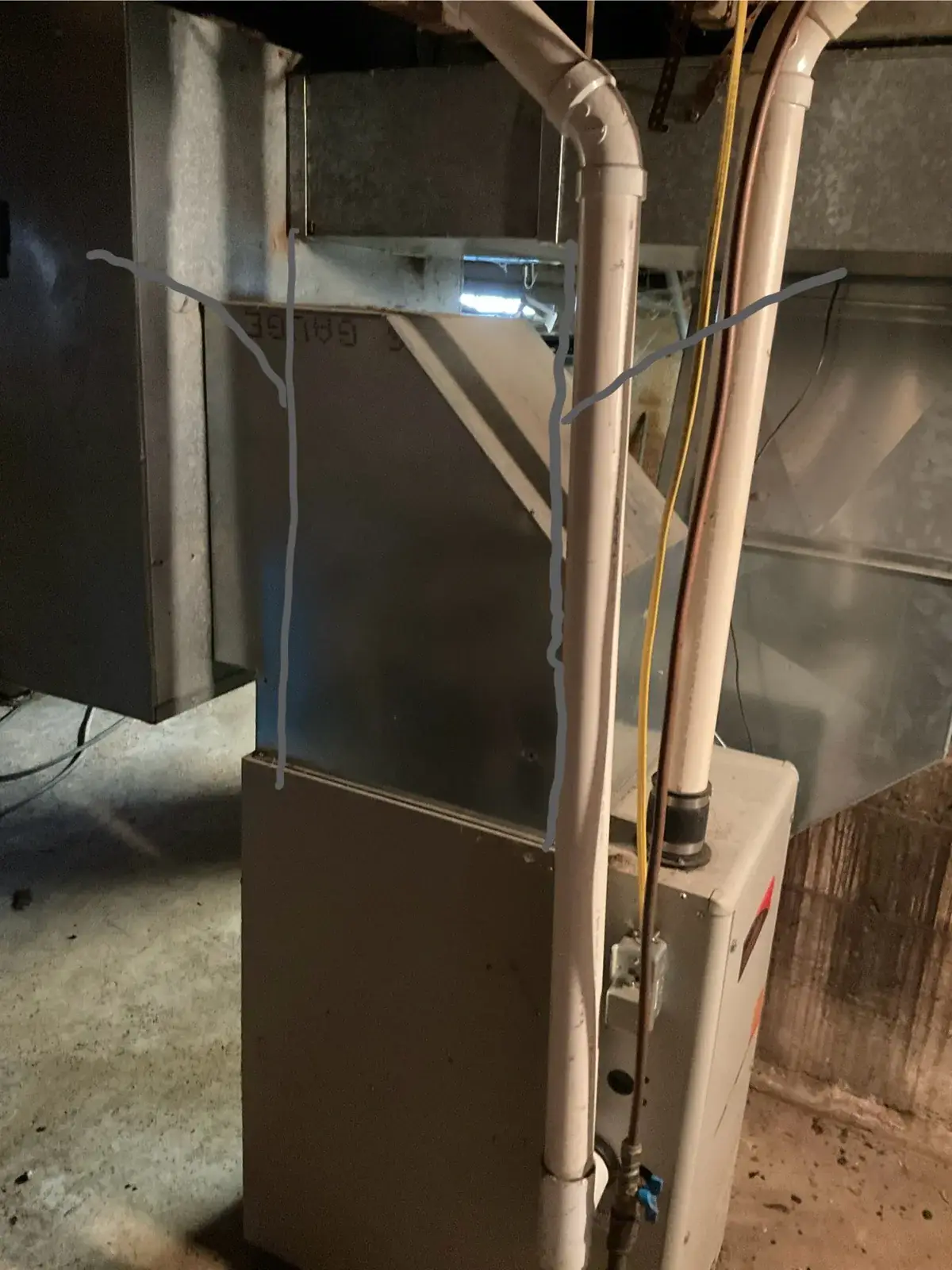 Before — old furnace and plenum marked out for replacement