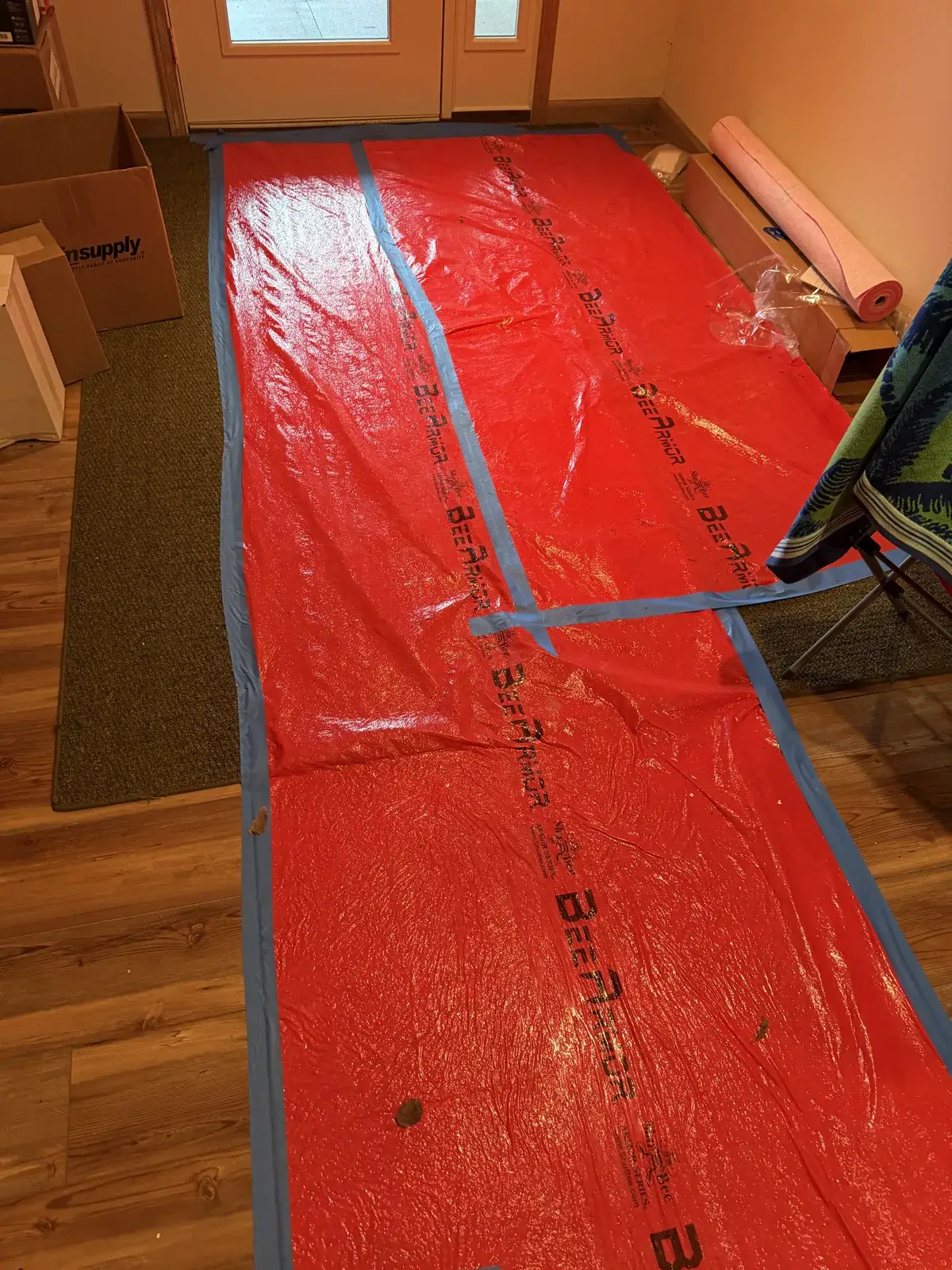 During install — clean, covered work area from door to mechanical room