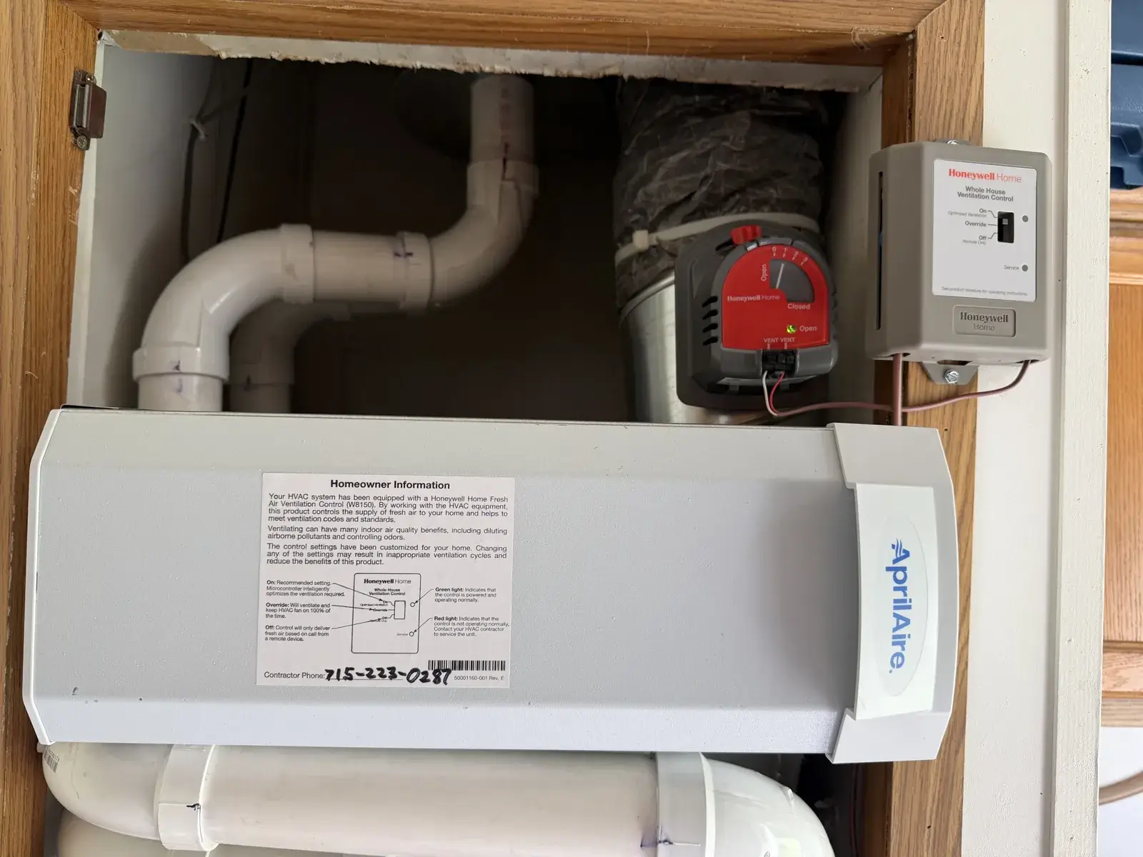 After — whole-house ventilation control and fresh-air damper set up on the same mobile home system