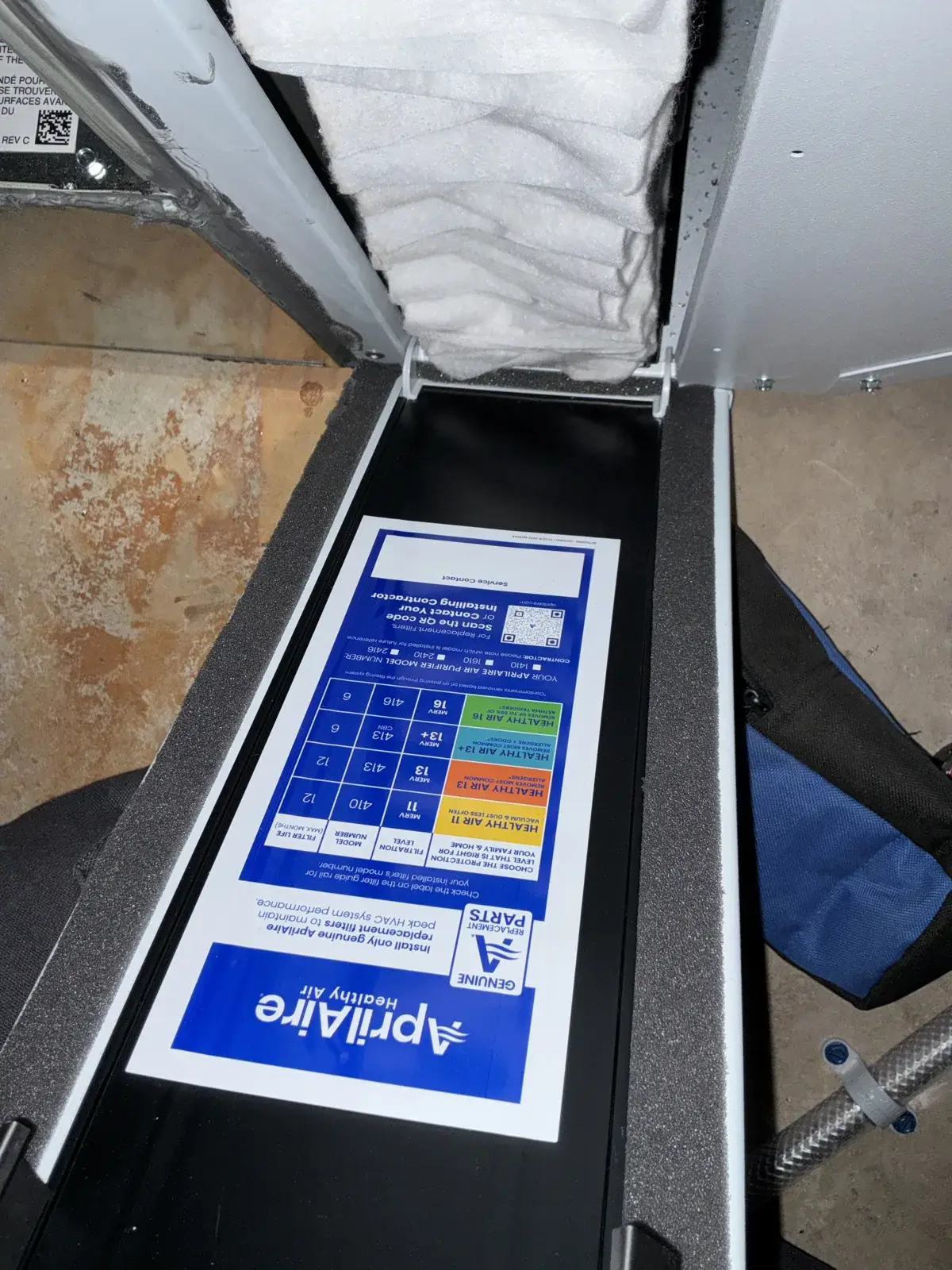 After — new AprilAire media filter in its cabinet