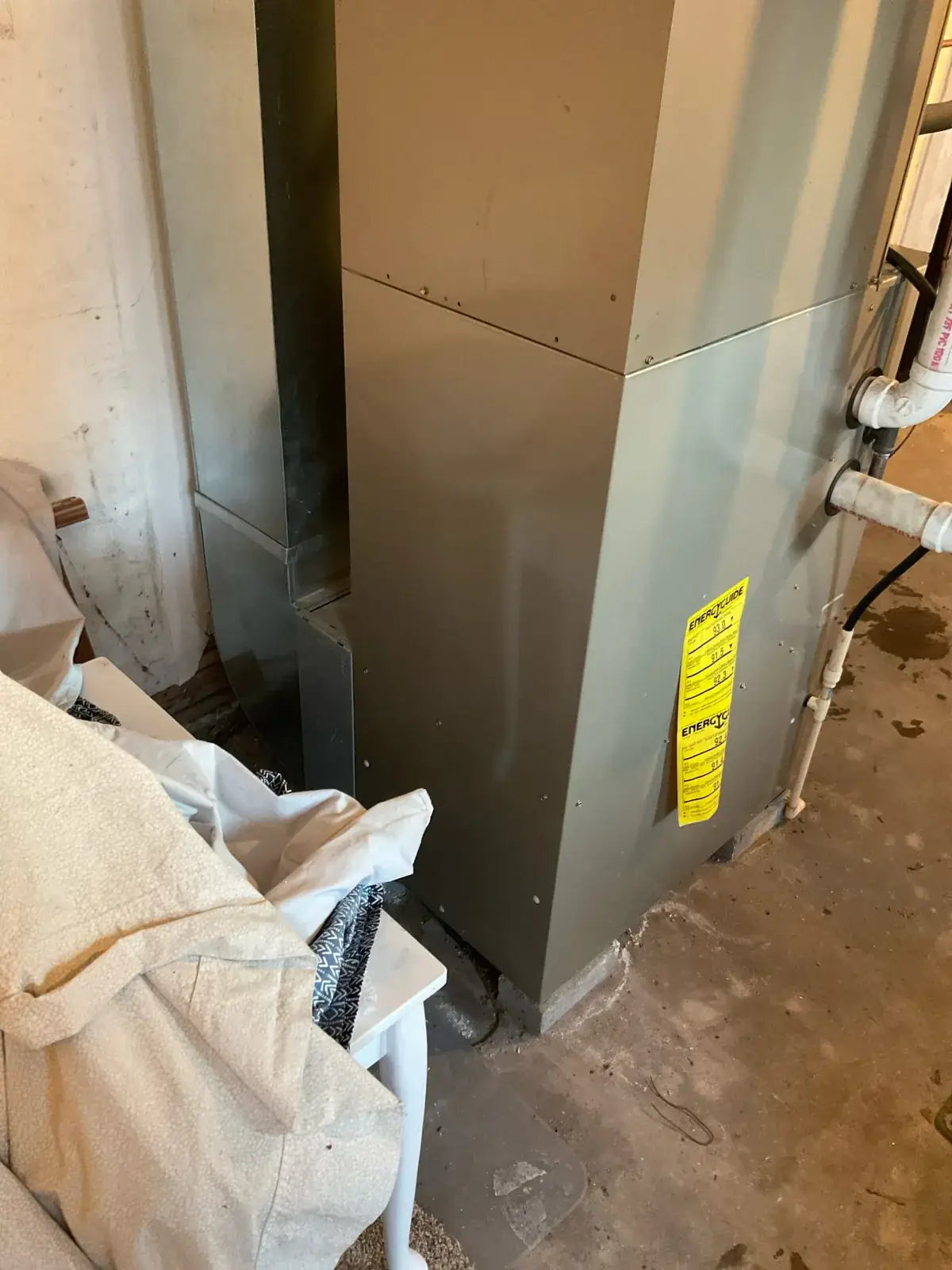 Before — the original furnace and ductwork it replaced