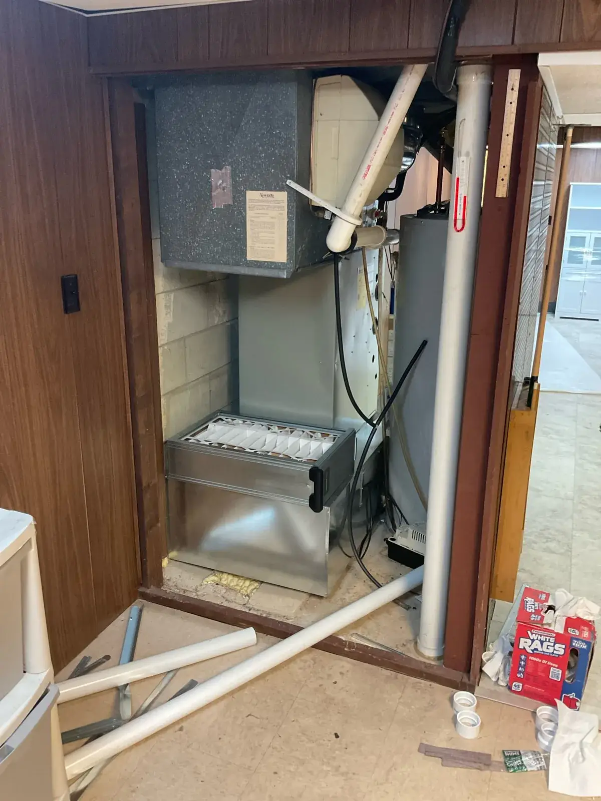 During install — the old furnace coming out - Wausau, WI
