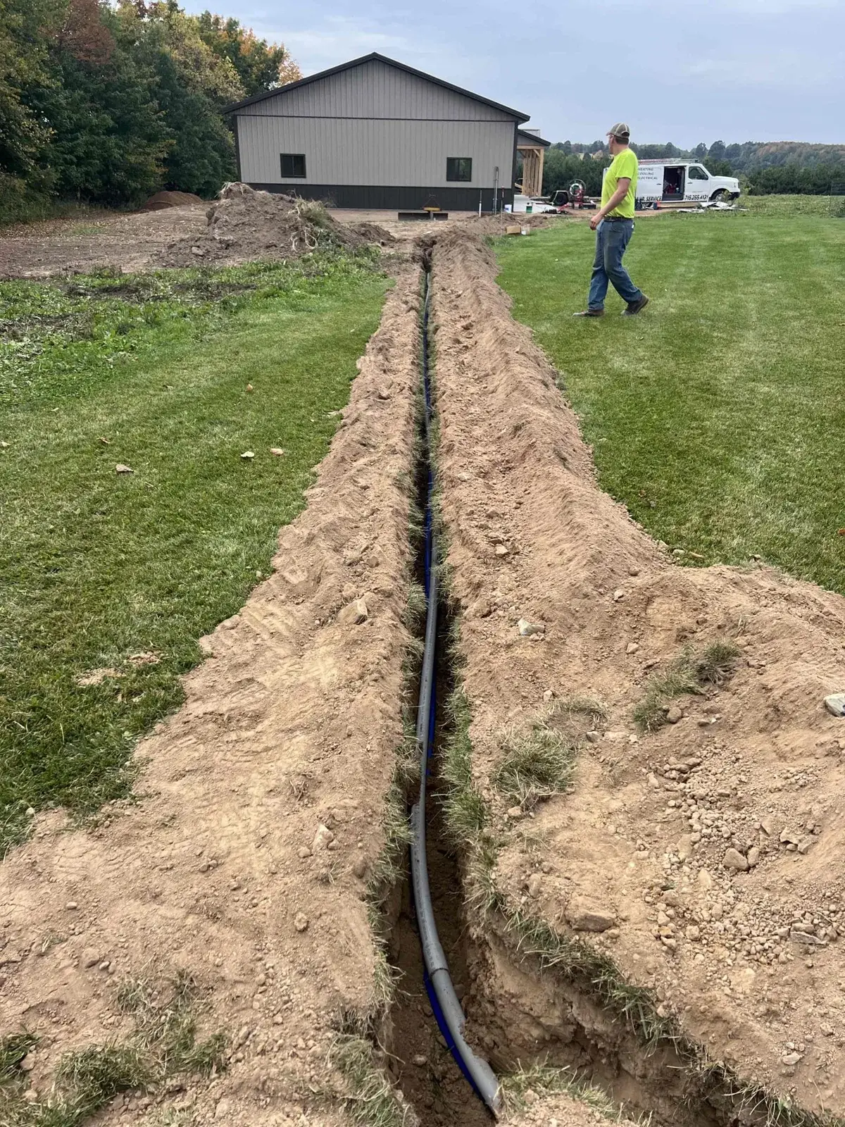 During install — trenching a new underground electrical run - Wausau, WI